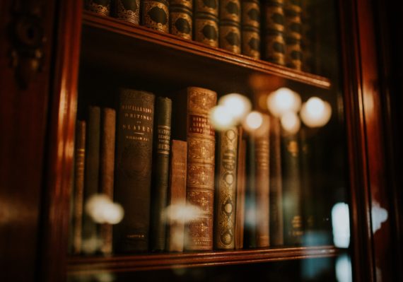 books in glass bookcase