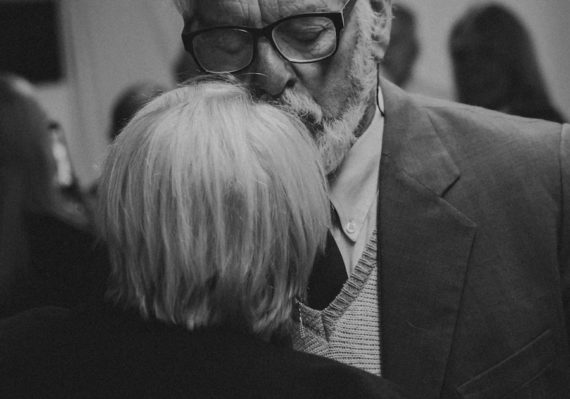 a black and white photo of a man and a woman